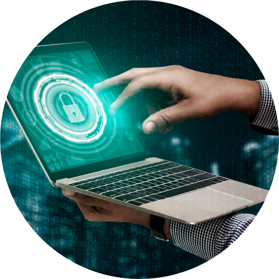 Hand and computer working in cybersecurity