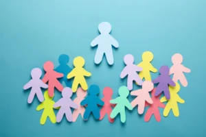 Colorful cutouts of people on a blue background