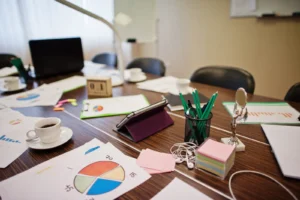 A desk littered with lots of items to enhance a person's development